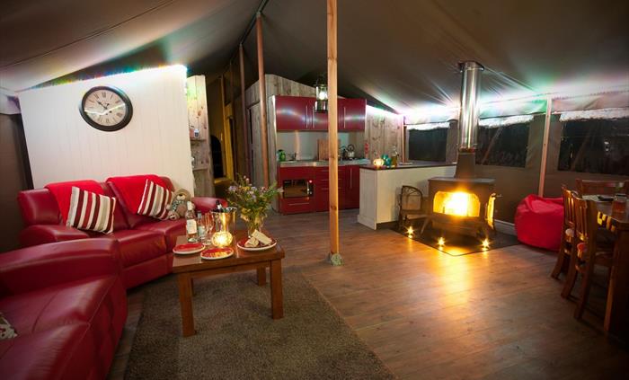 The interior is spacious and comfortably caters for up to 8 people.  Woodburner and well equipped kitchen should you wish to cook!